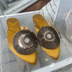 Sun and moon satin and leather slippers